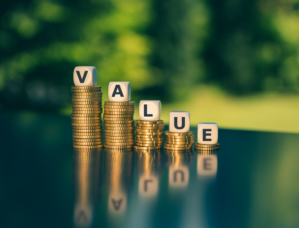 Symbol for decreasing value. Dice form the word "value" on decreasing stacks of coins.